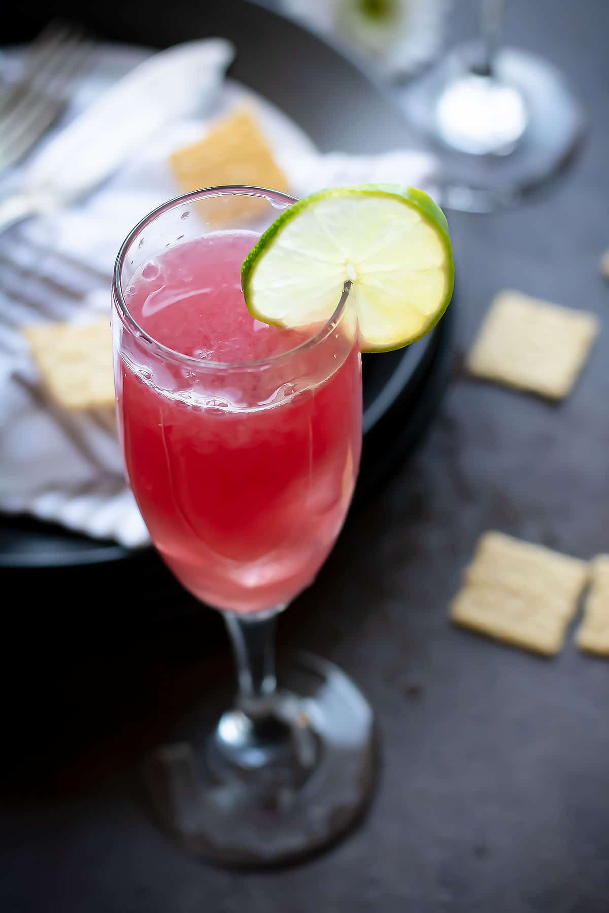 pomegranate punch with lime slice