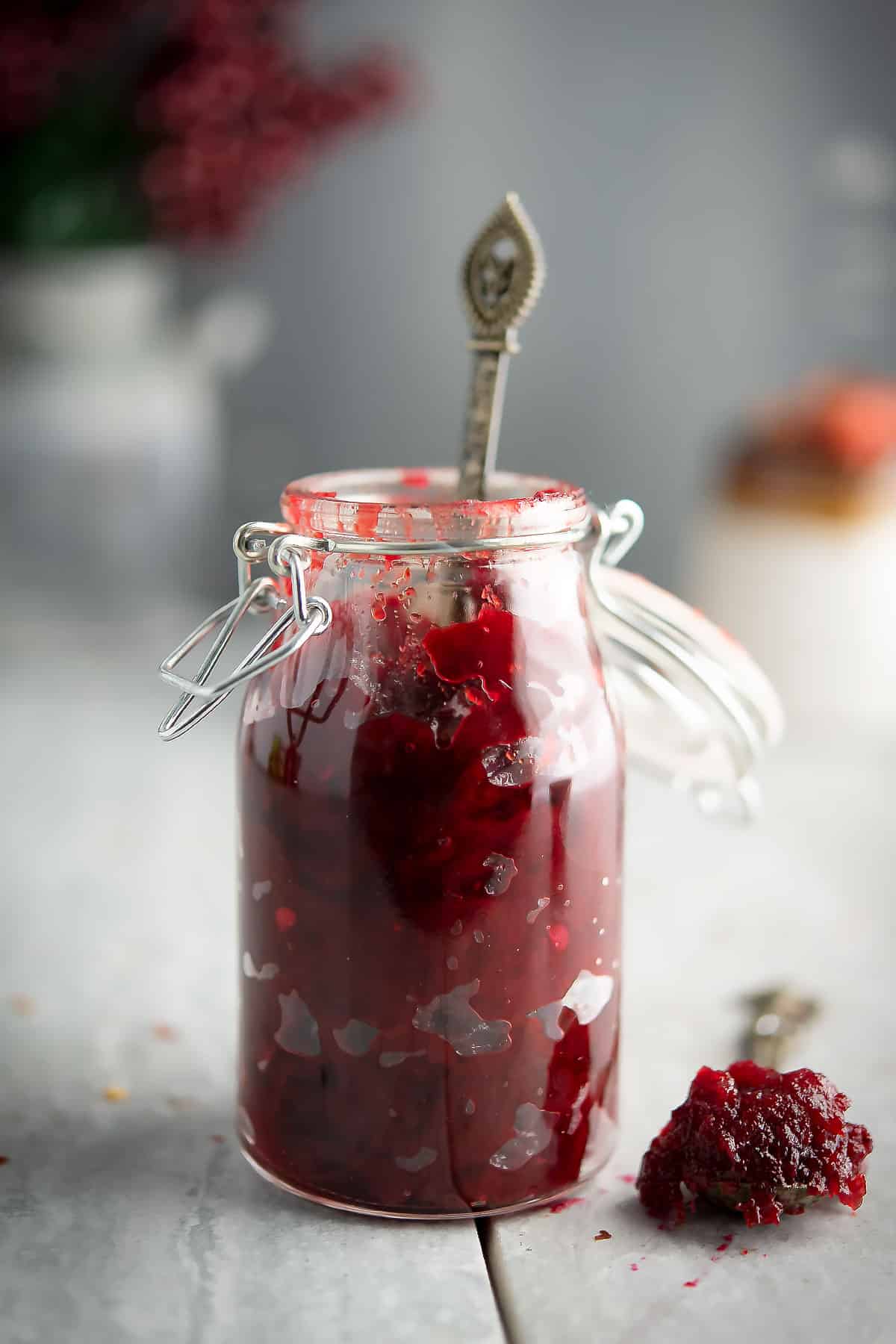 spicy cranberry relish in a glass jar