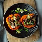 This eggplant stuffed peppers is vegan that's effortless to make, and it tastes delicious also Made with rice and a delicious tangy sauce.