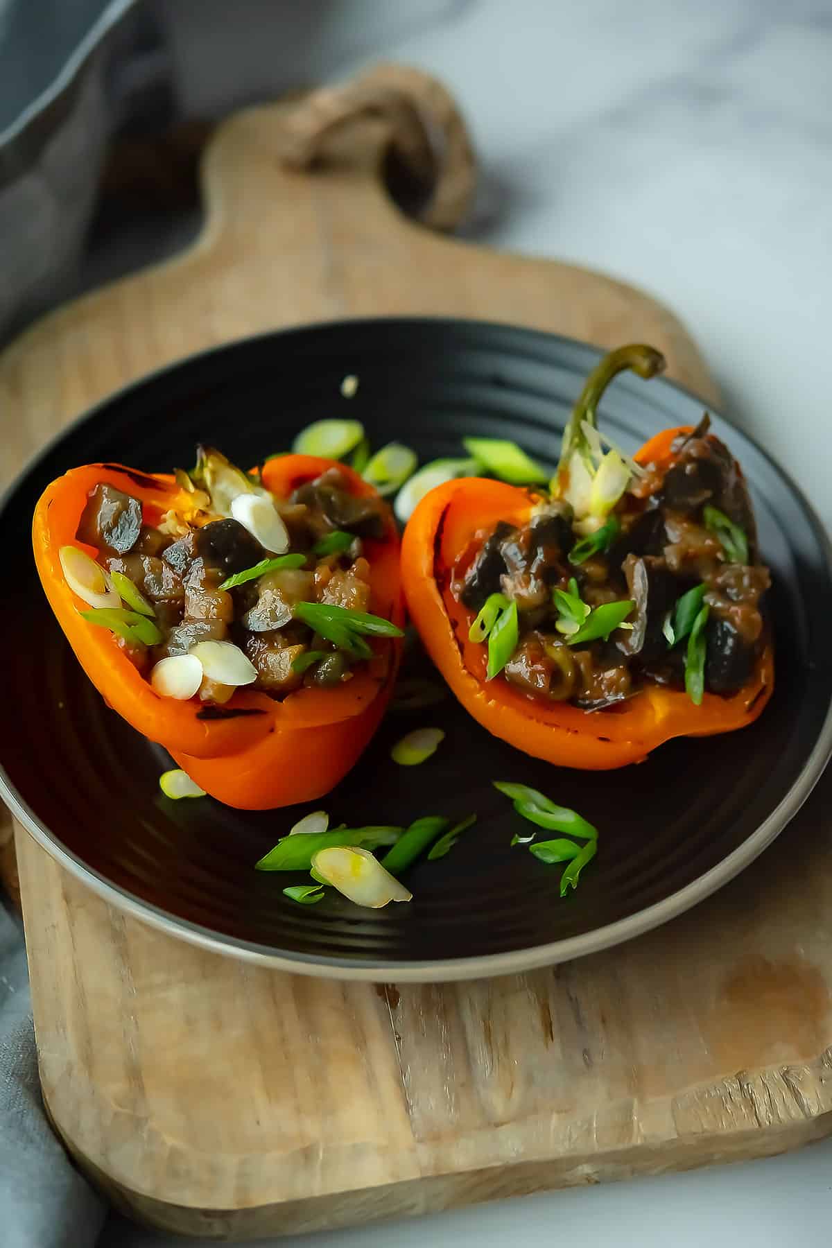 delicious peppers are in a black plate