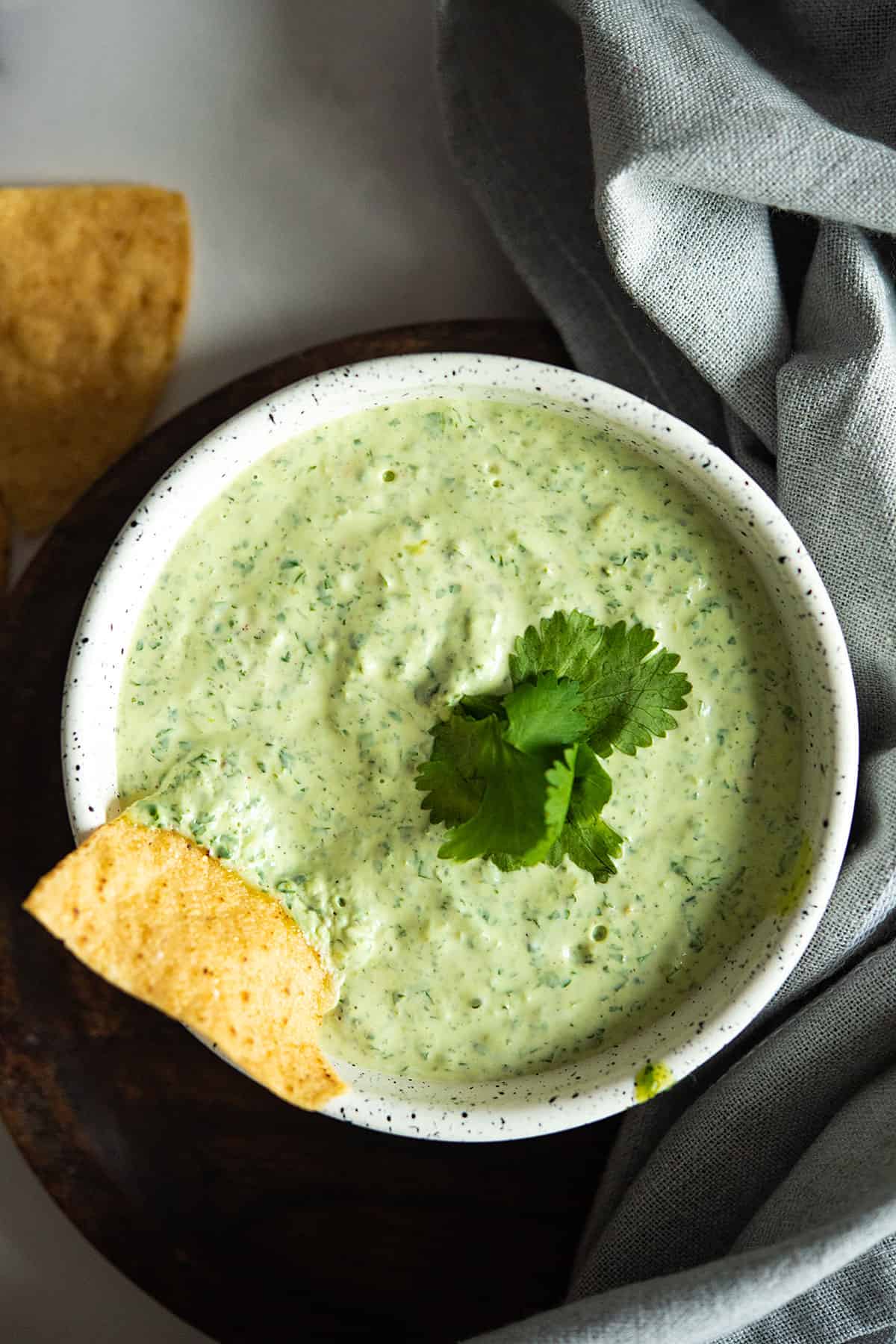 tasty jalapeno cilantro dip in a bowl with tortilla chips