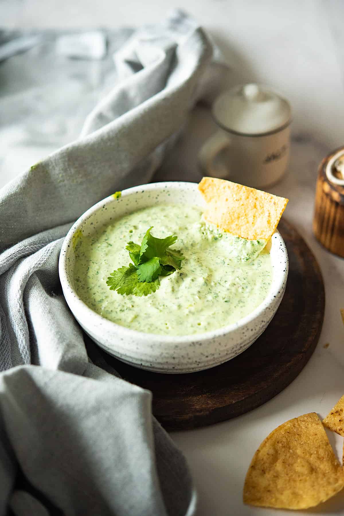 jalapeno cilantro sauce is placed in a bowl