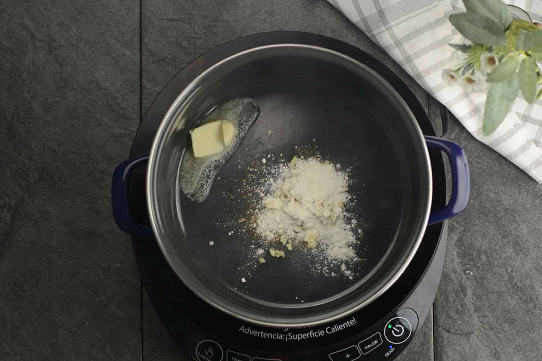 roast the flour in the butter until color changes slightly