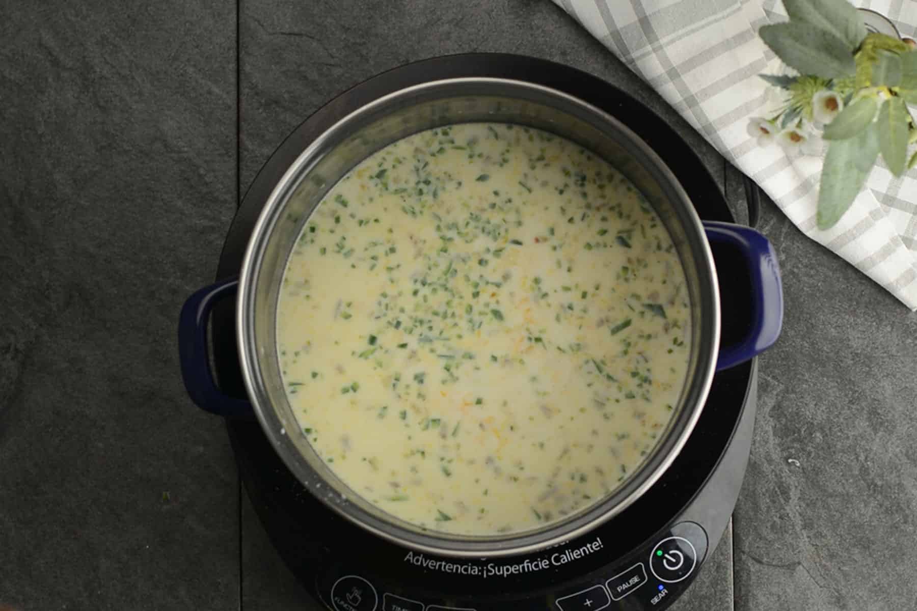 cooking the spicy cheese sauce