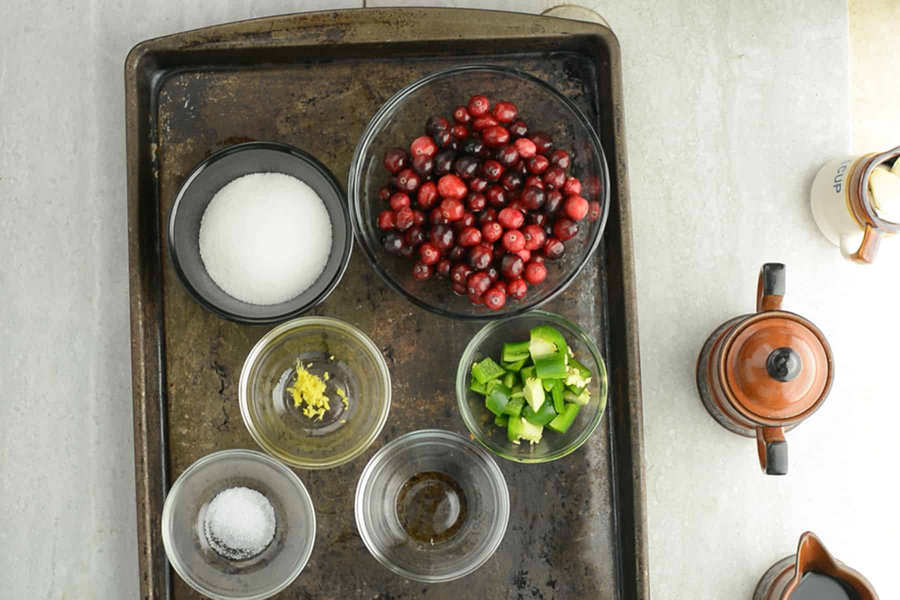 cranberry, jalapeno, and other ingredients are placed in a tray