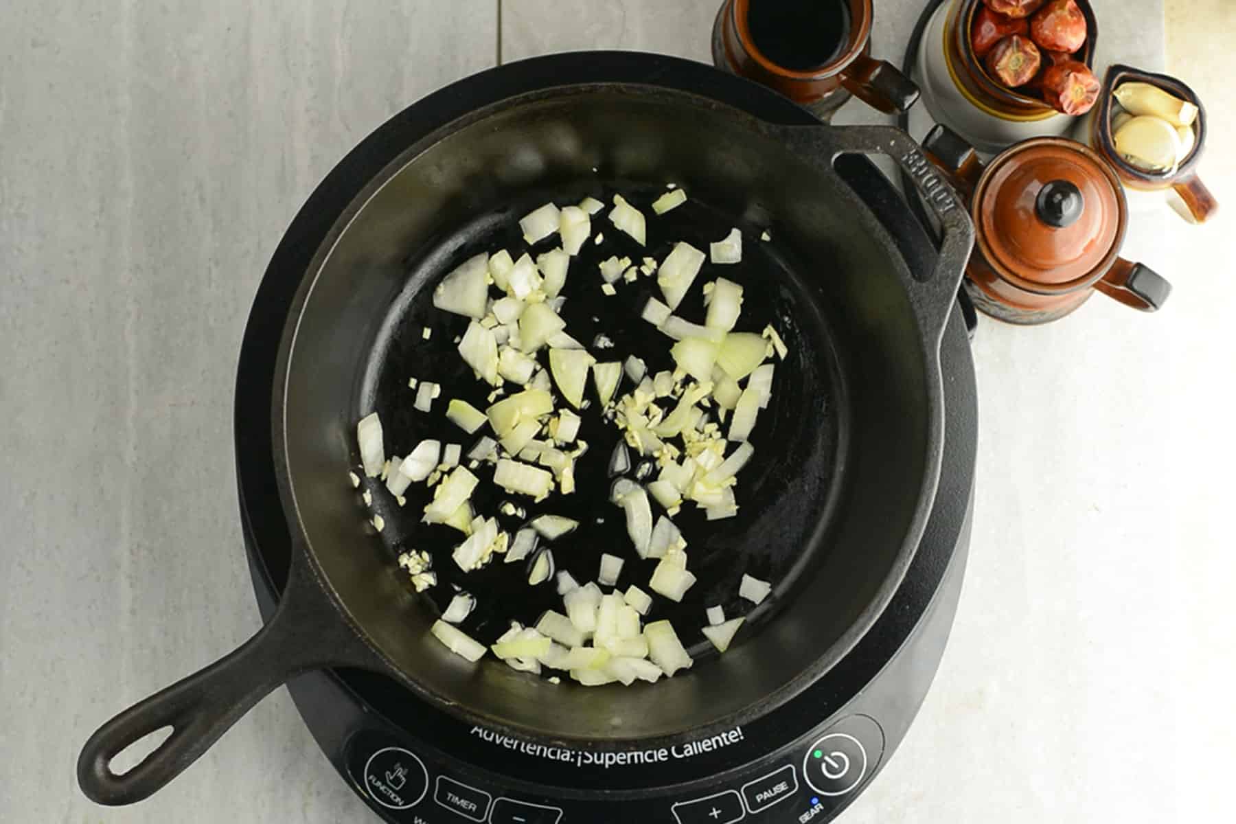 sauteing onion for making peppers, onion, and potato