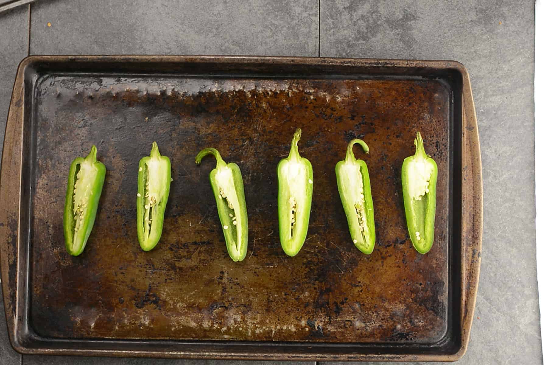 jalapenos are sliced and placed in a tray