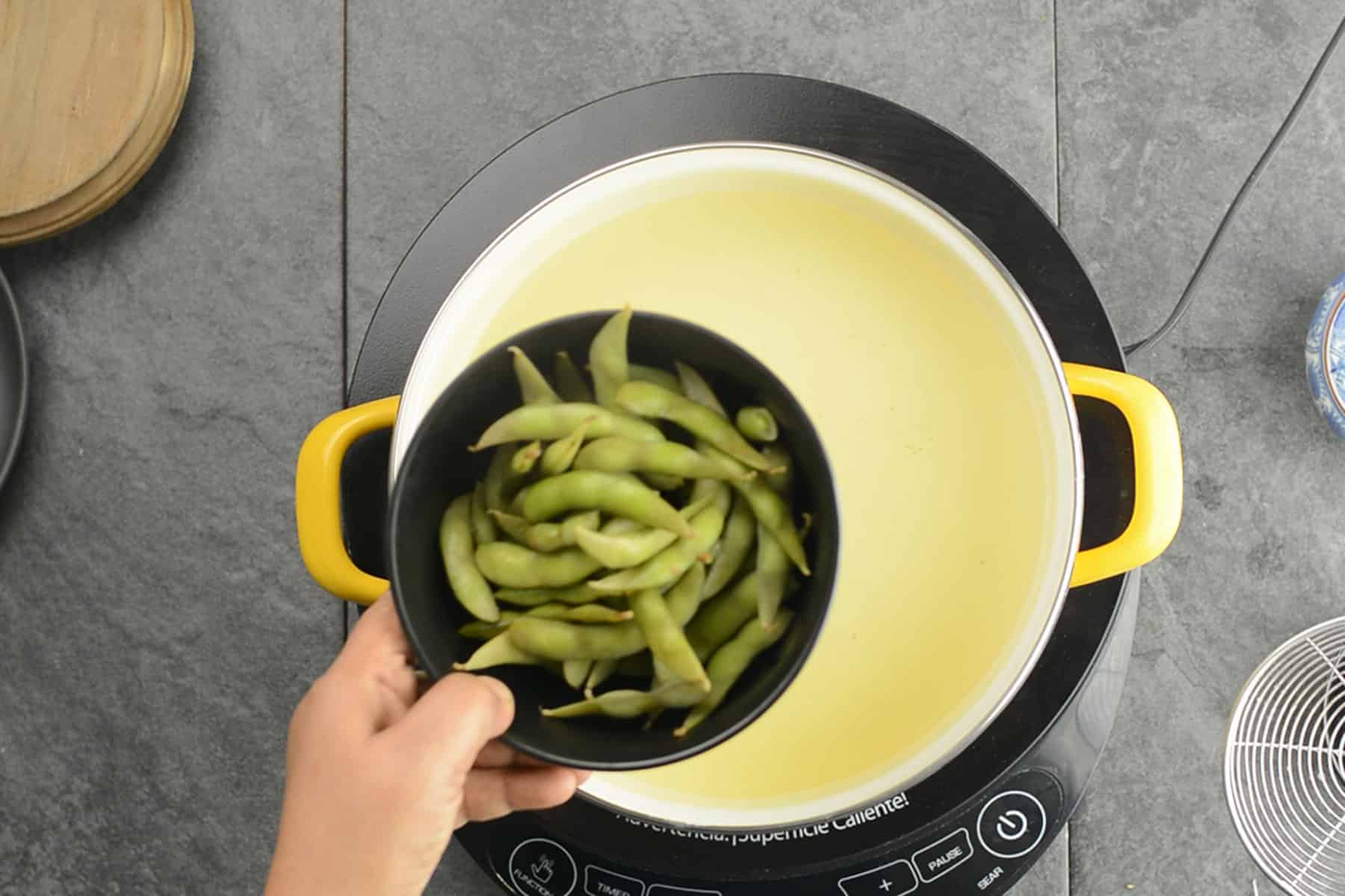 transfer cooked edamame to a bowl