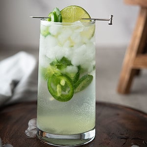 Savor a spicy twist on a classic with our Jalapeno Mojito recipe! Fresh mint, lime, jalapeno, and sparkling water makes this drink fabulous!!