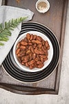 curried almonds served in a bowl