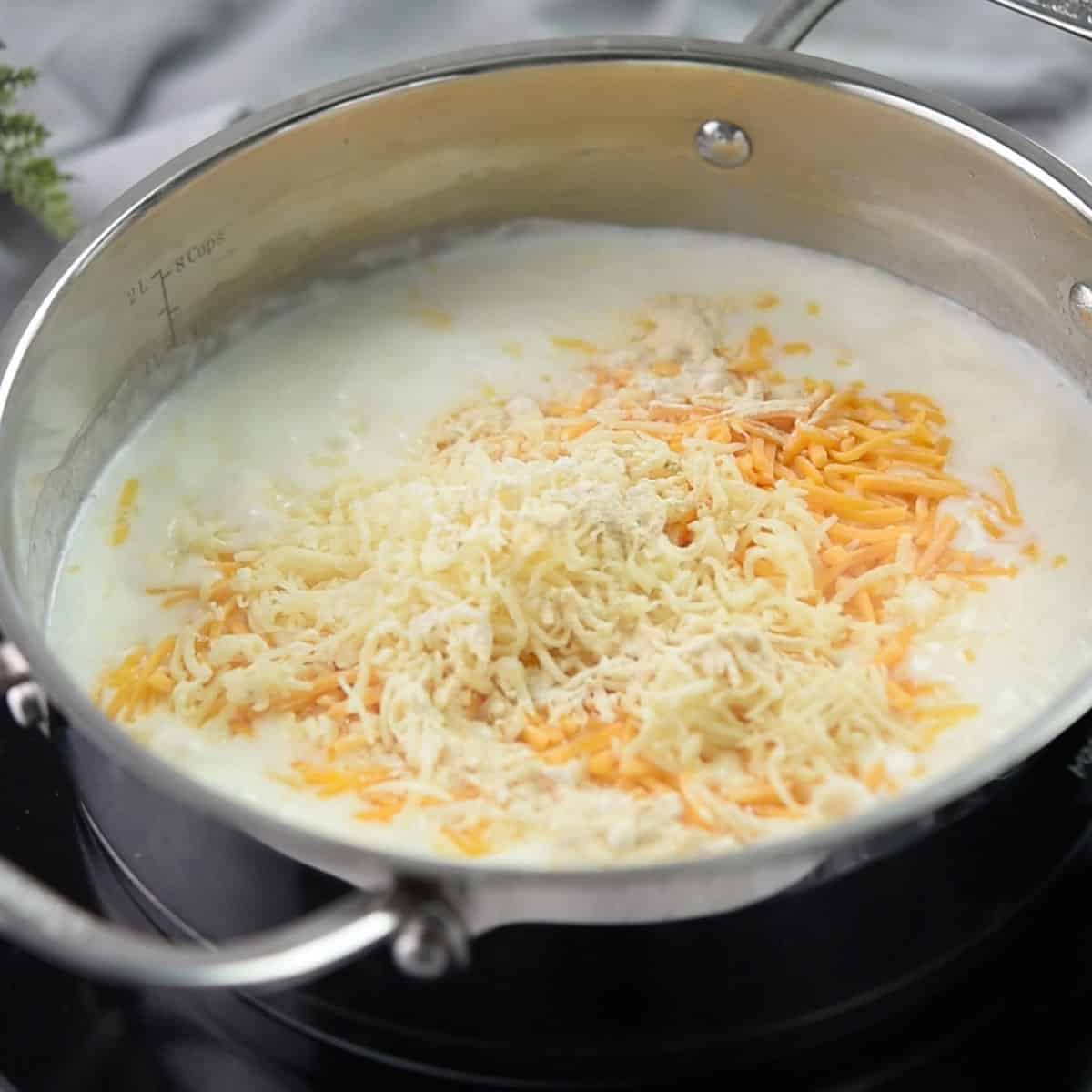 stir in cheese for how to make spicy mac and cheese 
