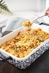 spicy mac and cheese with cheesy string baked in the pan