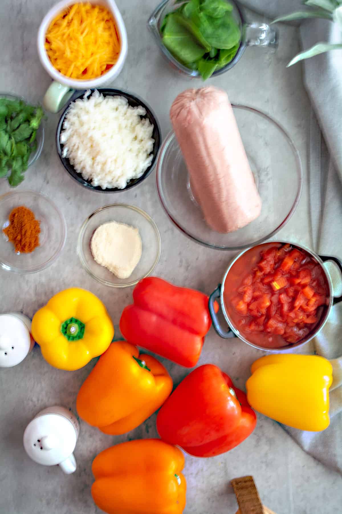 ingredients for making the stuffed bell peppers are assembled