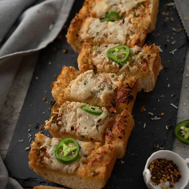 This jalapeno garlic bread is quick and easy. You find in every bite is loaded with cheesy, garlic-spicy butter. Perfect for all occasions.
