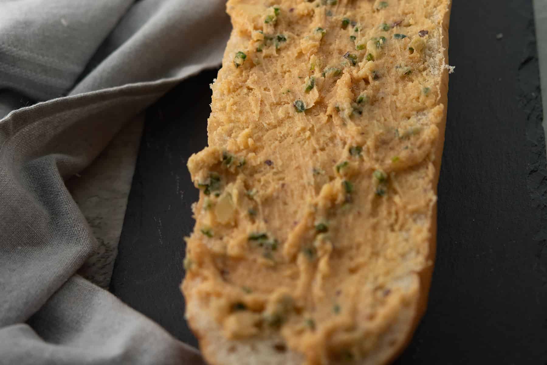 butter spread over the bread
