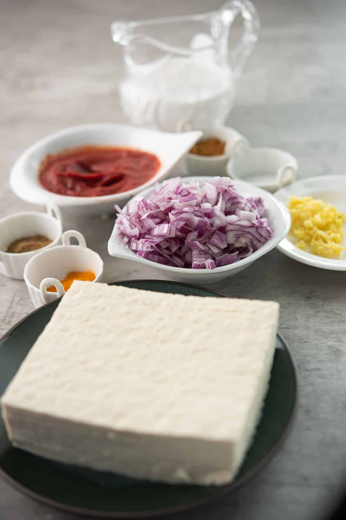 ingredients are arranged for making tofu curry