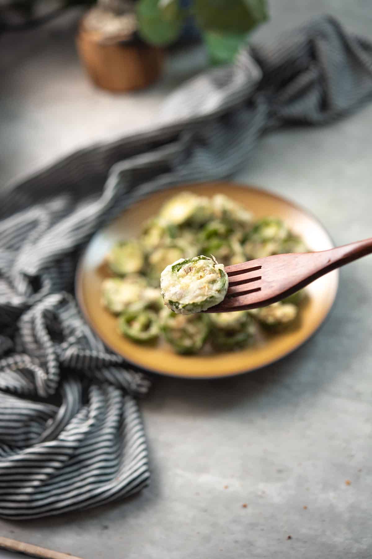 deep fried jalapeno shown with fork