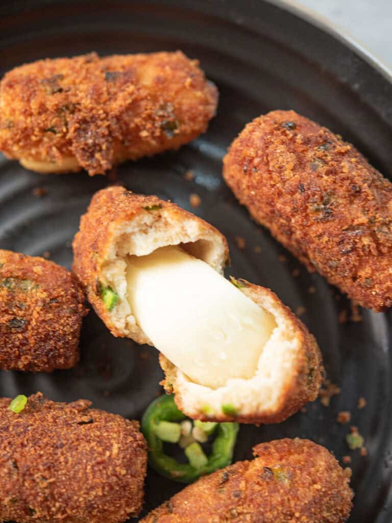 cheesey strings inside popping from the Jalapeno Cheese Sticks