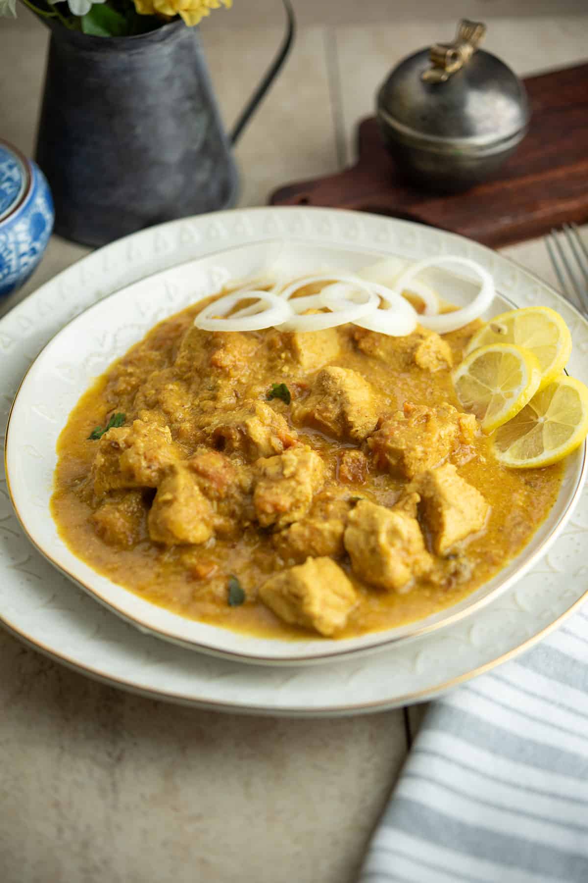 chicken curry instant pot served with a fork in the dinner table during weekday