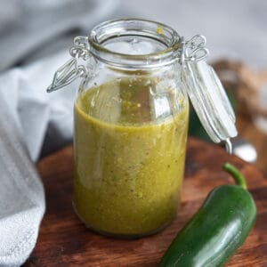 jalapeno hot sauce in a glass jar