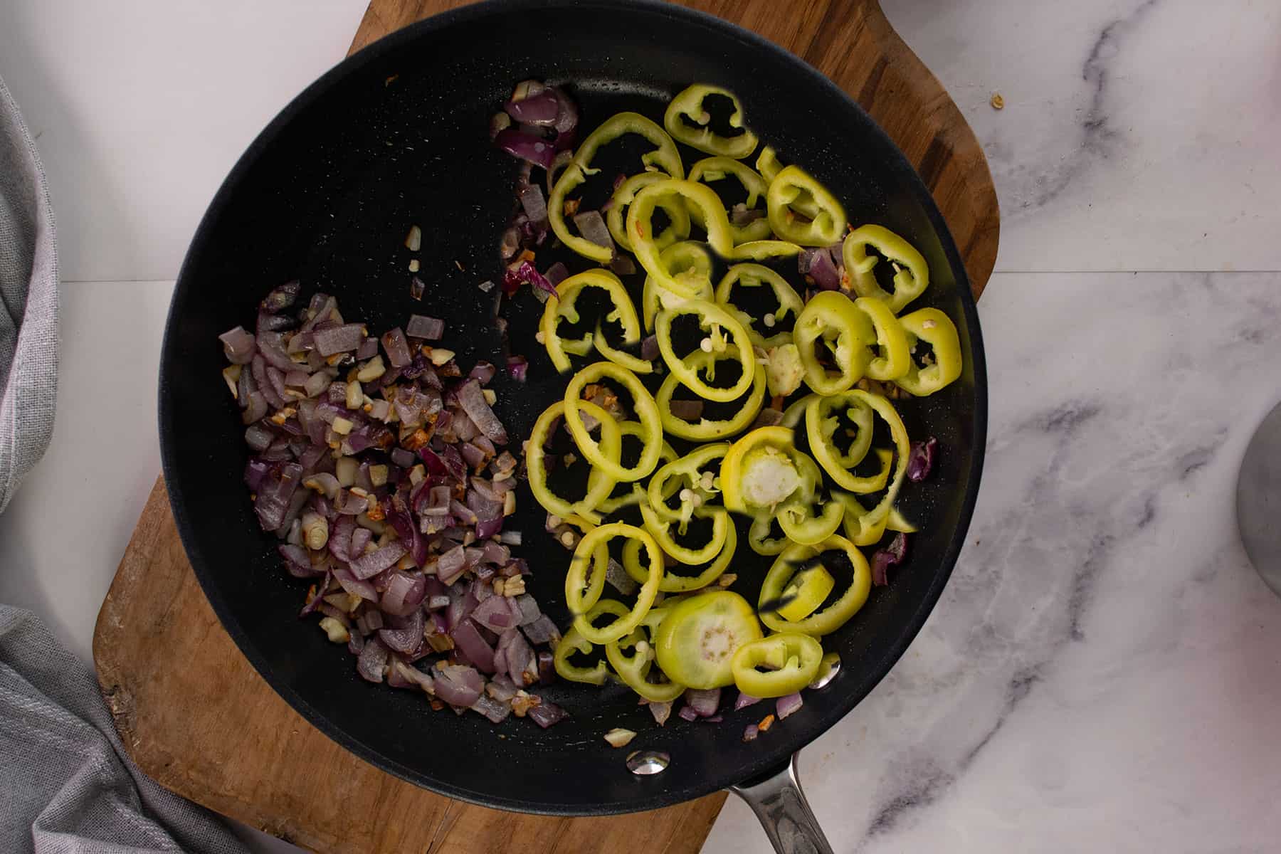 onion and garlic sauteed until soft for making banana pepper sauce