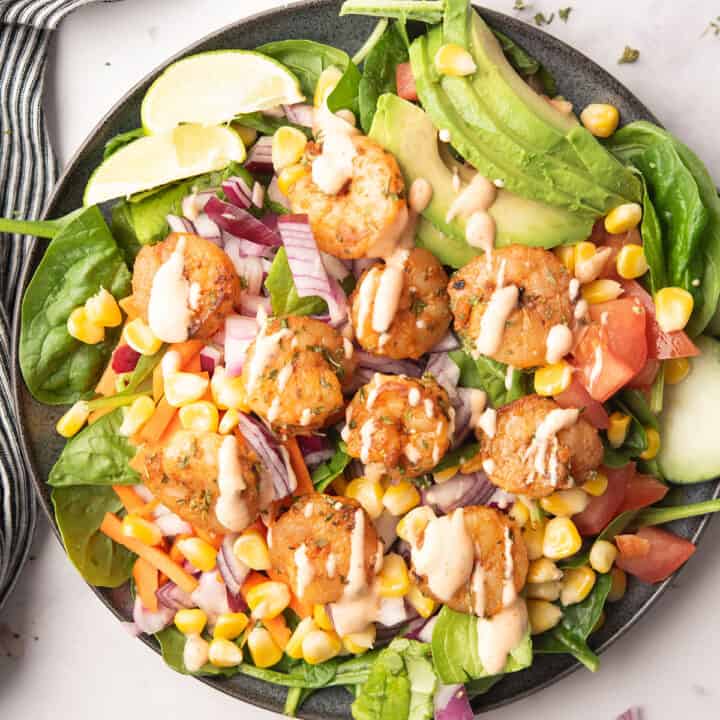 Savor the flavors: Cajun Shrimp Salad recipe, a perfect blend of spicy shrimp and fresh greens, with a tangy, spicy dressing. Quick & Tasty!