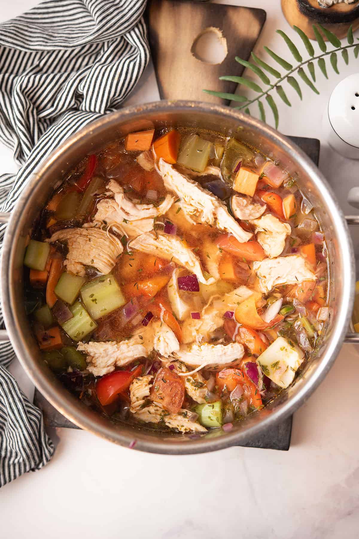 paprika chicken soup with vegetables and shredded chicken is ready to enjoy