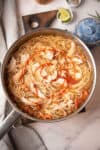 spicy chicken noodles soup in a pan