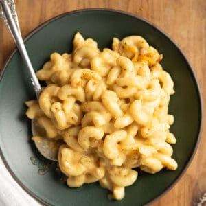 curry mac and cheese served in a black plate