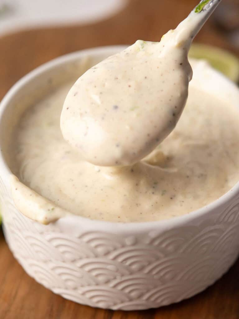 ginger aioli is ready to serve with a spoon and bowl