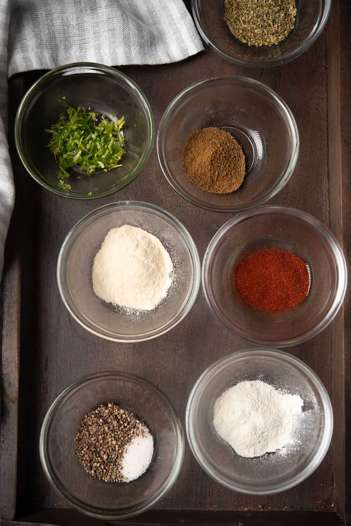 chili lime seasoning ingredients assembled in a mini glass bowls