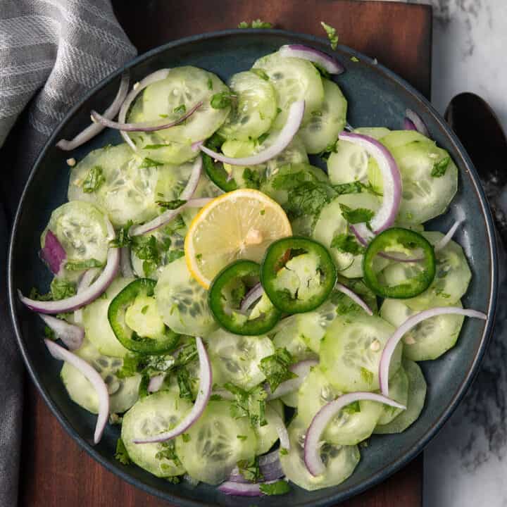 cucumber jalapeno salad served in a side dish plate