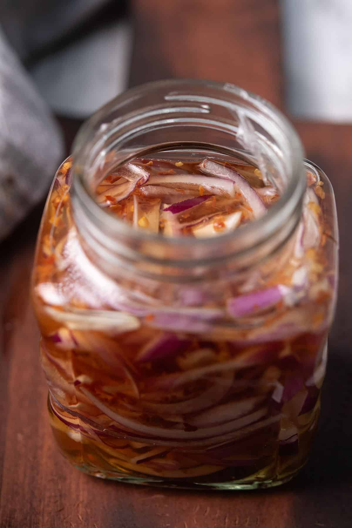 Mexican spicy pickled onions stored in air tight container