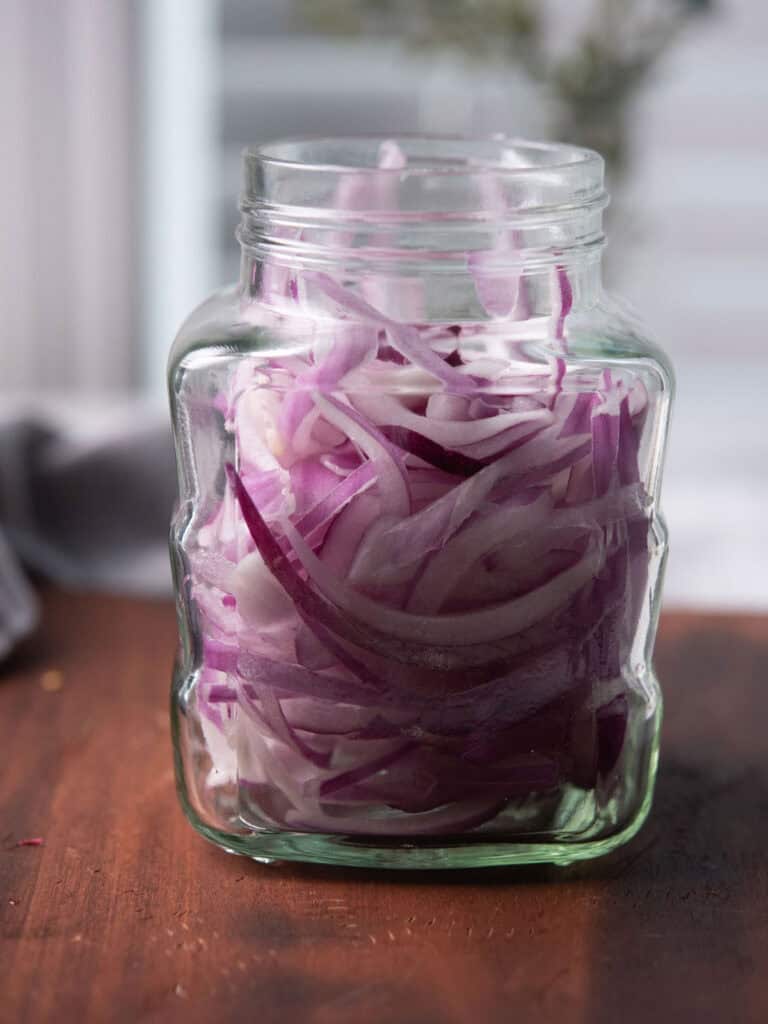 spicy pickled onion filled in a jar