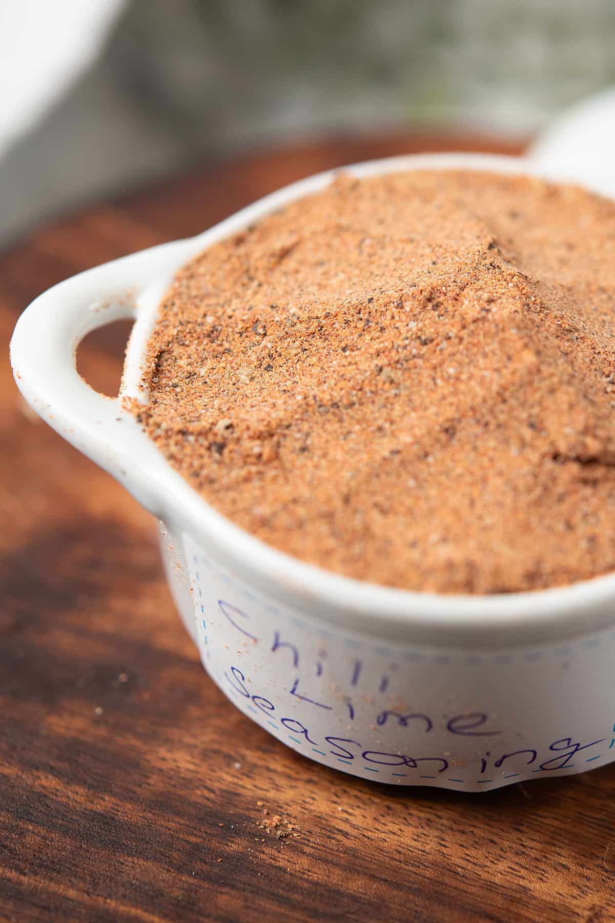 close up view of copy cat trader joe's chili lime seasoning in a container