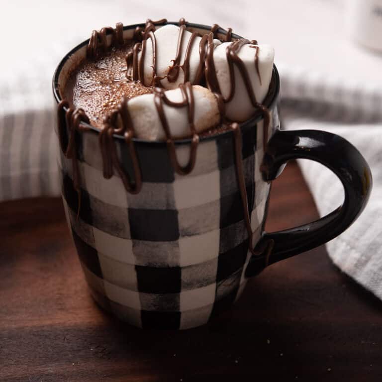 cajun hot chocolate served in a black& white cup