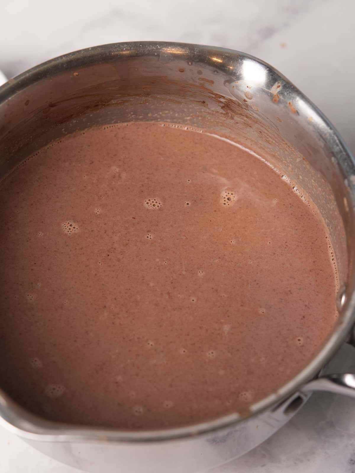  stirring for making Cajun hot chocolate