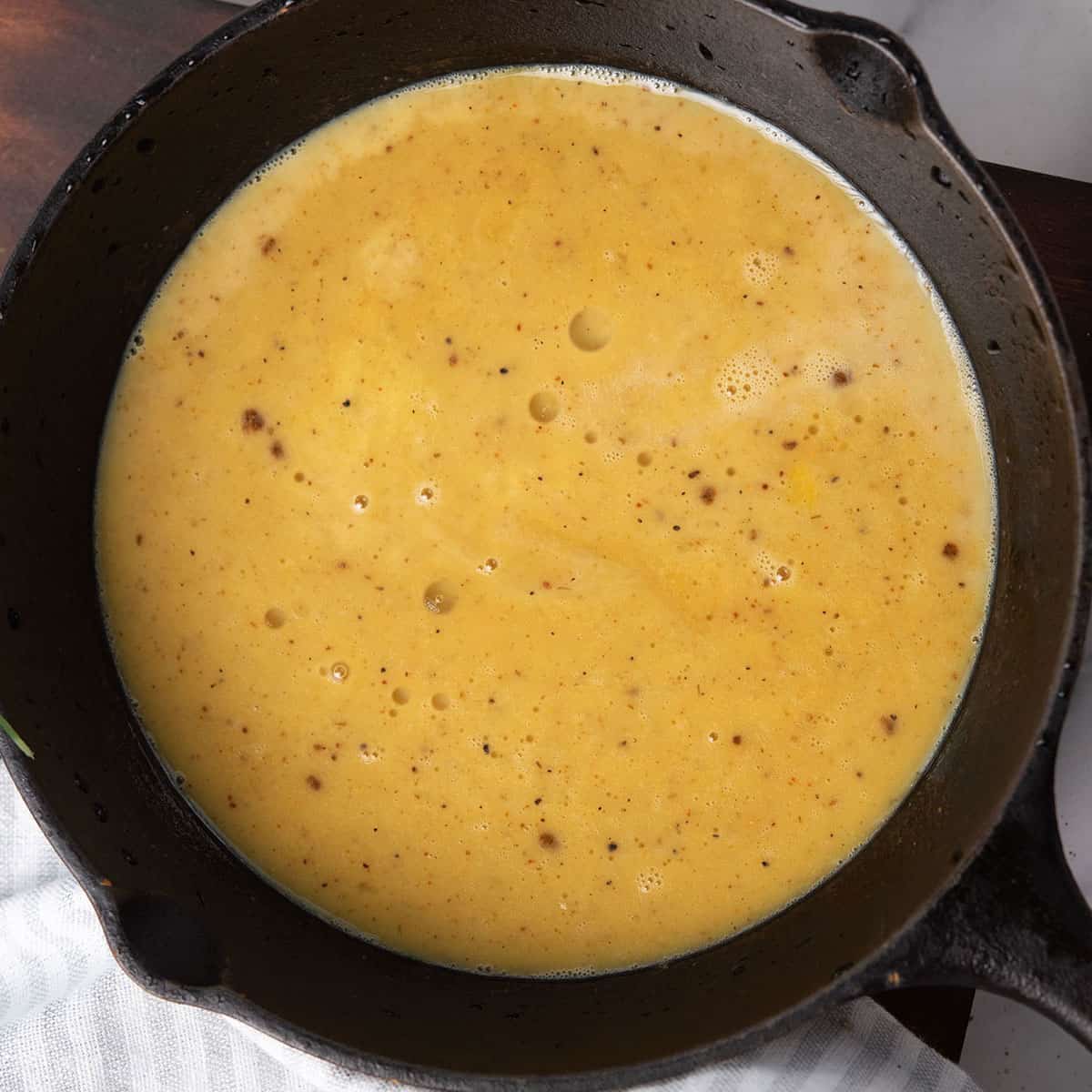 the pan with cajun scrambled eggs mixture