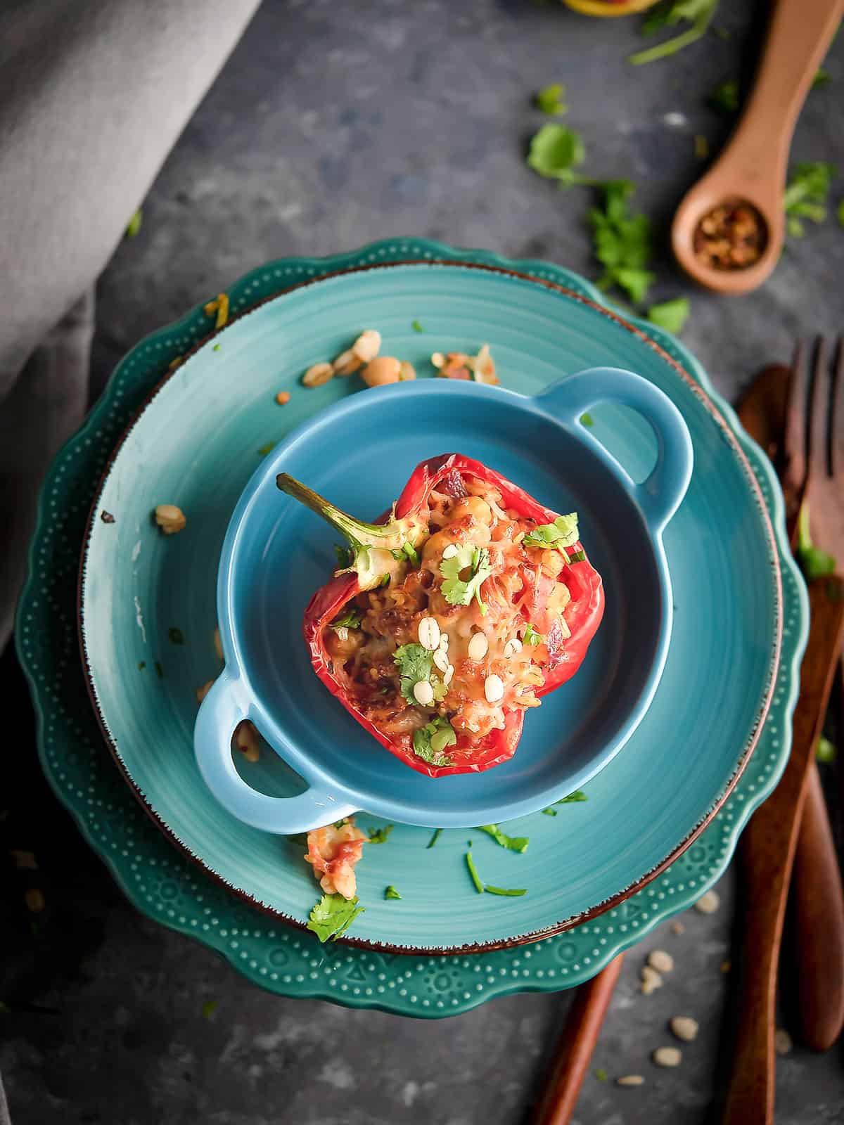 Close-up of barley stuffed bell peppers served in a plate.