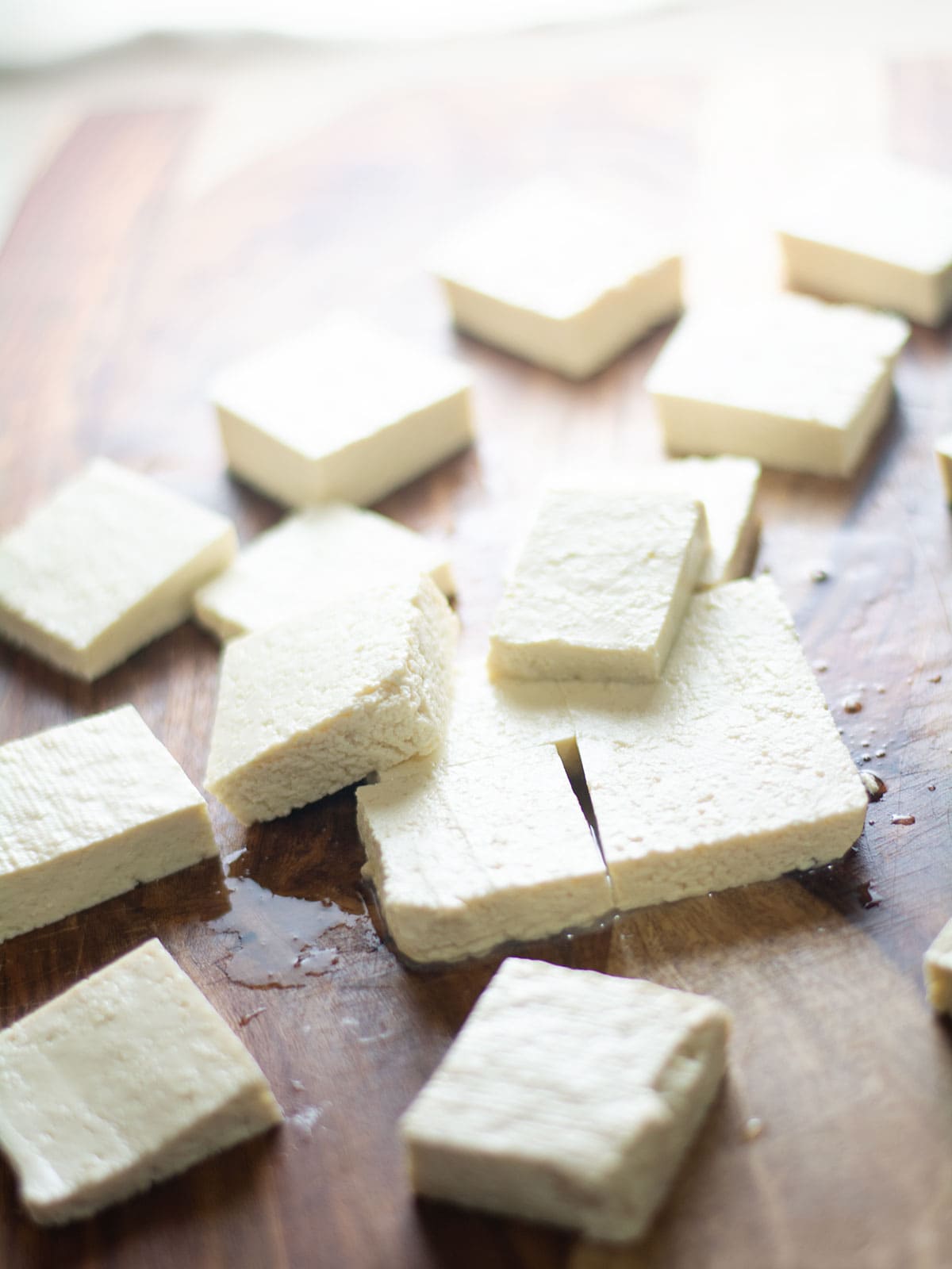 cutting tofu into bite size pieces