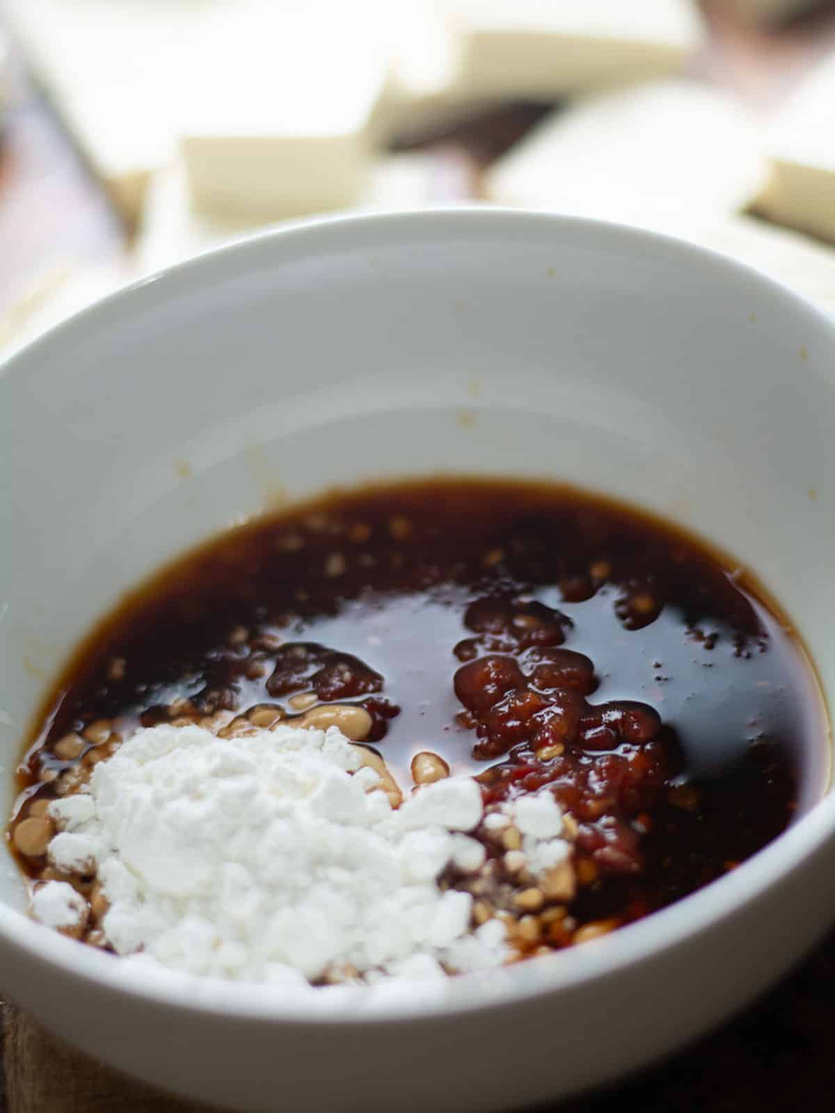 makig the sauce for spicy tofu steak