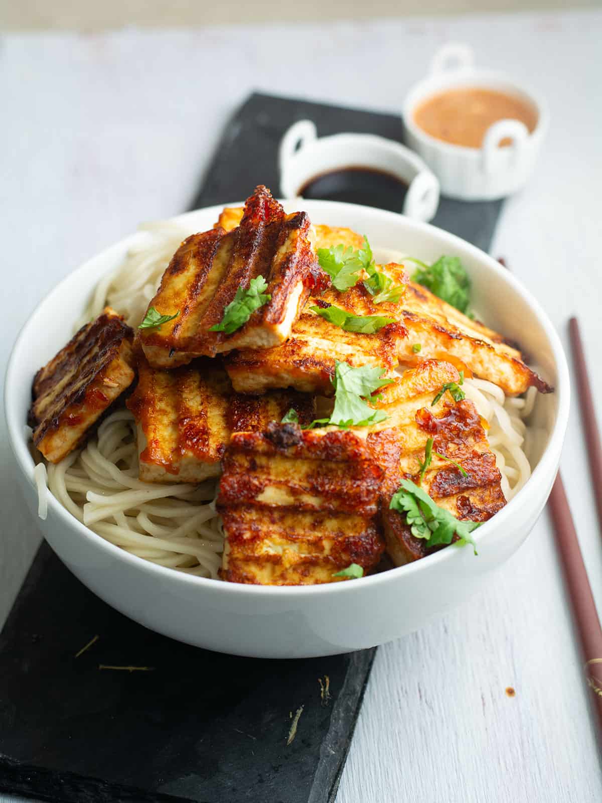 spcicy and crispy outside spicy tofu steak served in a bowl