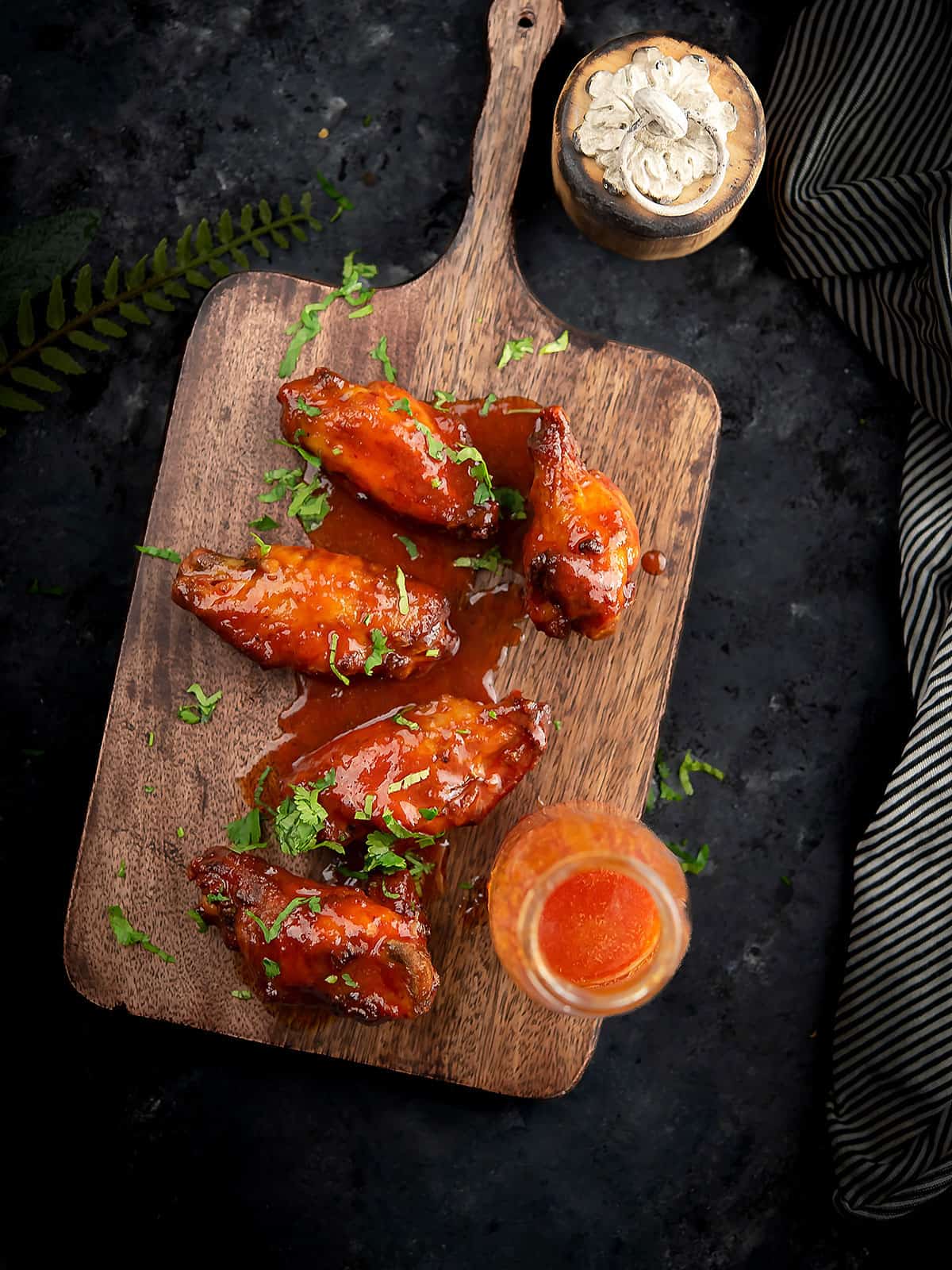 Crispy Hot Honey Lemon Pepper Wings drizzled with sweet and spicy sauce.
