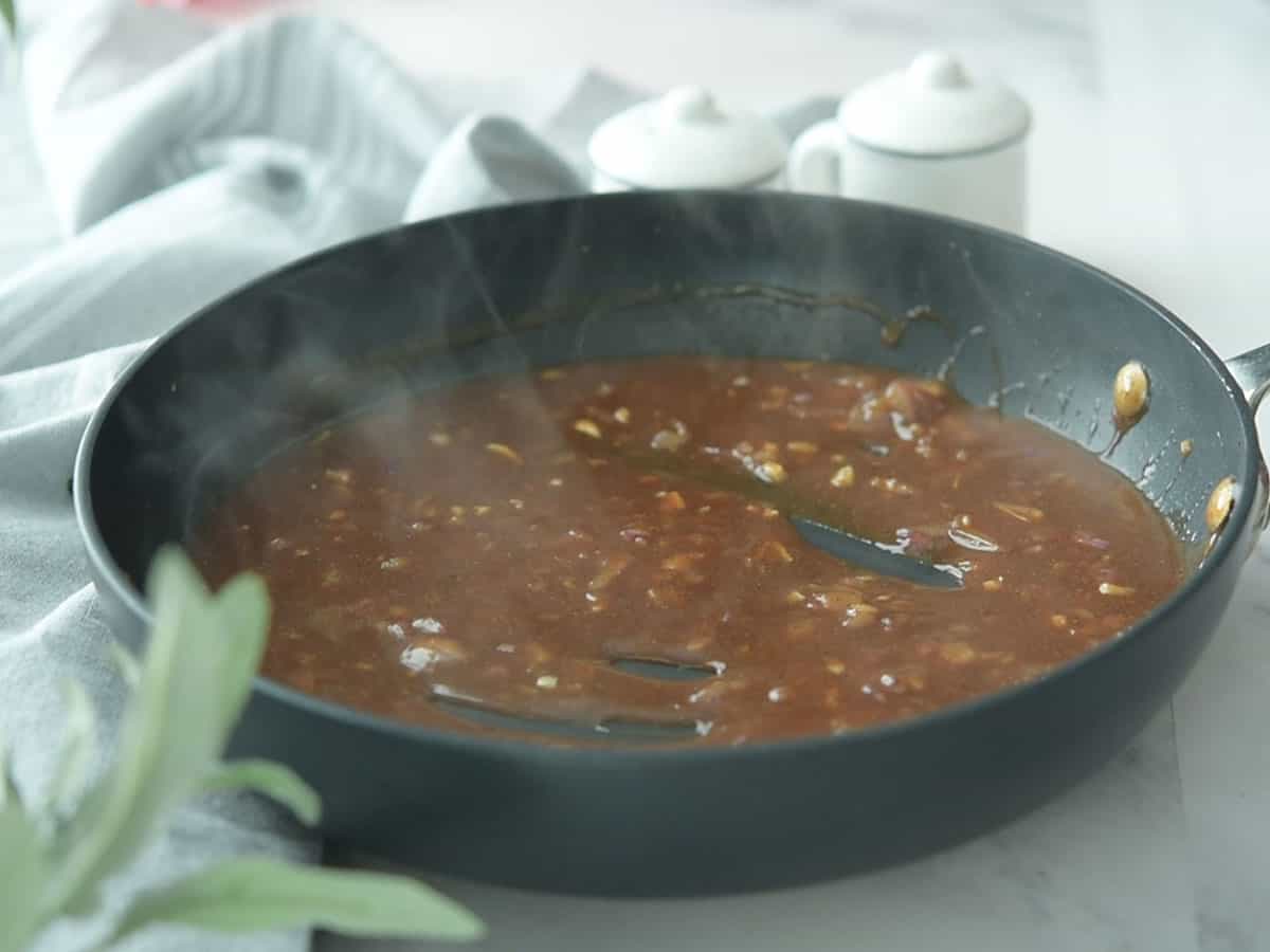 Final black pepper sauce ready to be served over meat.