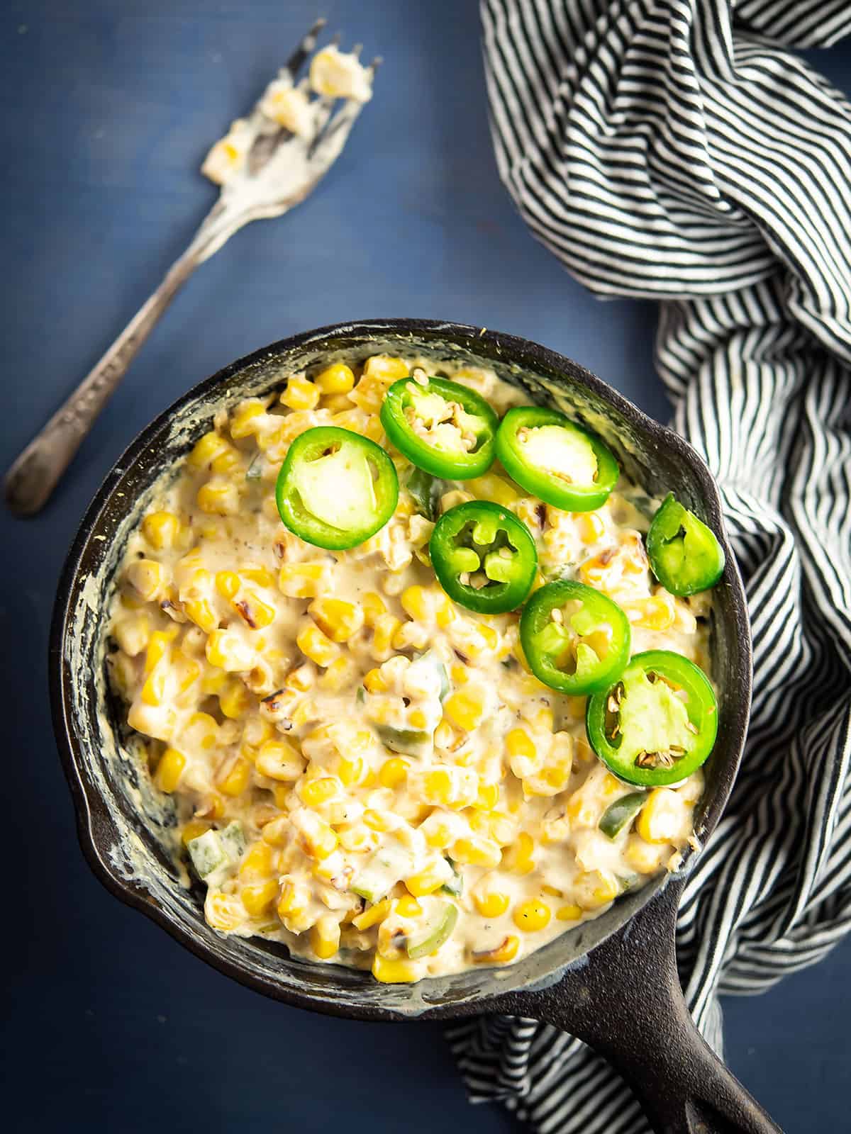 Creamy jalapeno corn served in a skillet