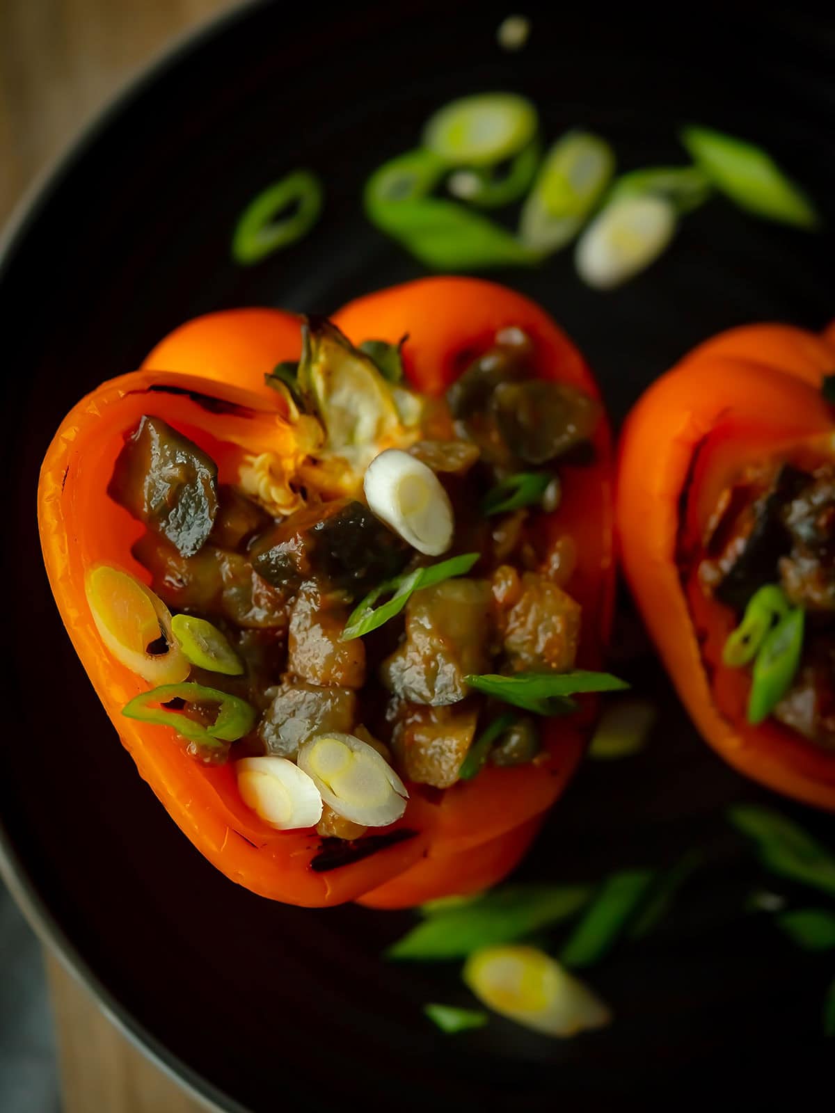 Close-up of eggplant stuffed peppers with vibrant colors