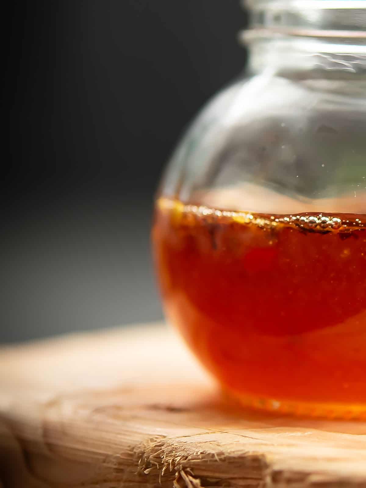 Close-up of homemade hot honey sauce in a jar