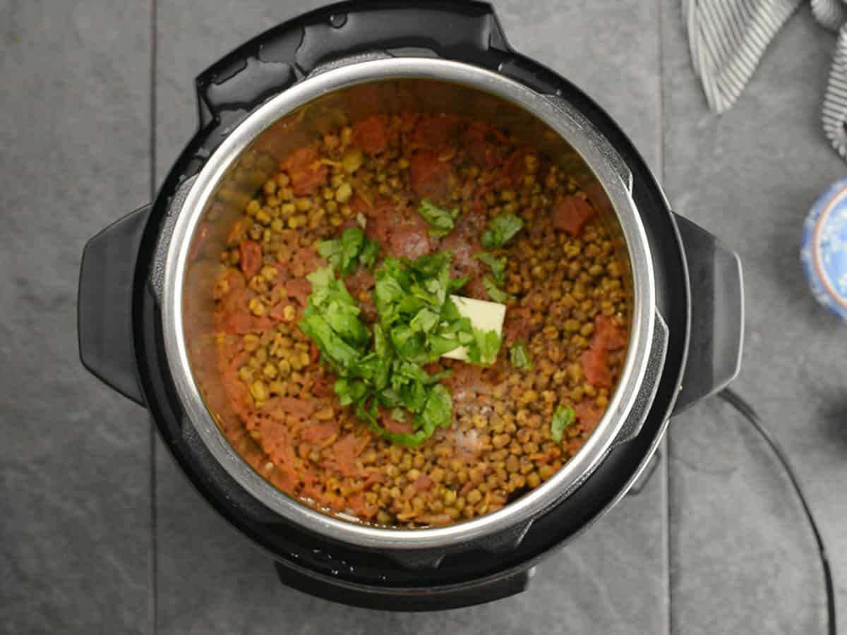 Finished mung bean curry being whisked before serving.
