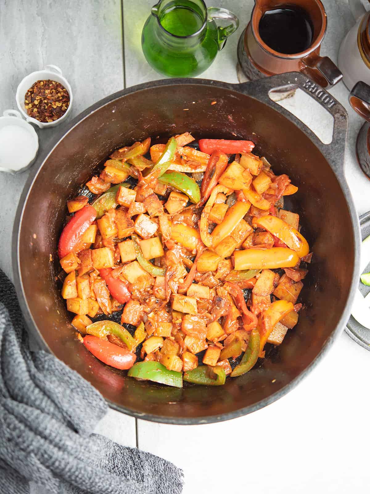 Delicious Pepperonata served in a bowl with colorful peppers and potatoes.