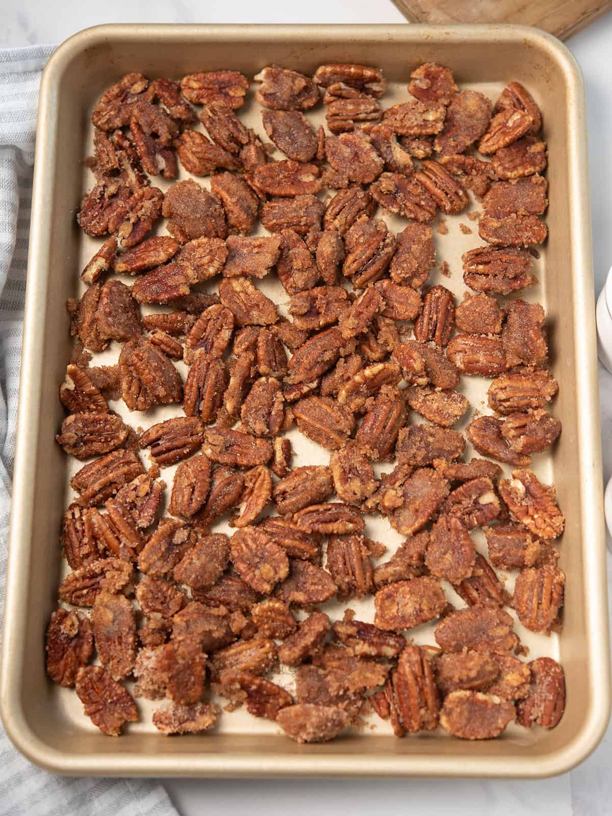 Baking sheet with ingredients spread out for roasting.